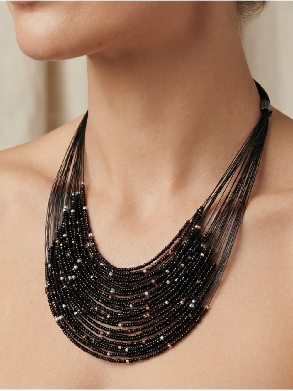 Decree Black Multi-Strand Beaded Necklace with White and Metallic Accents